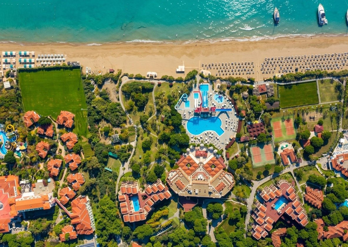 Asteria Family Resort Belek beachfront pools at sunset